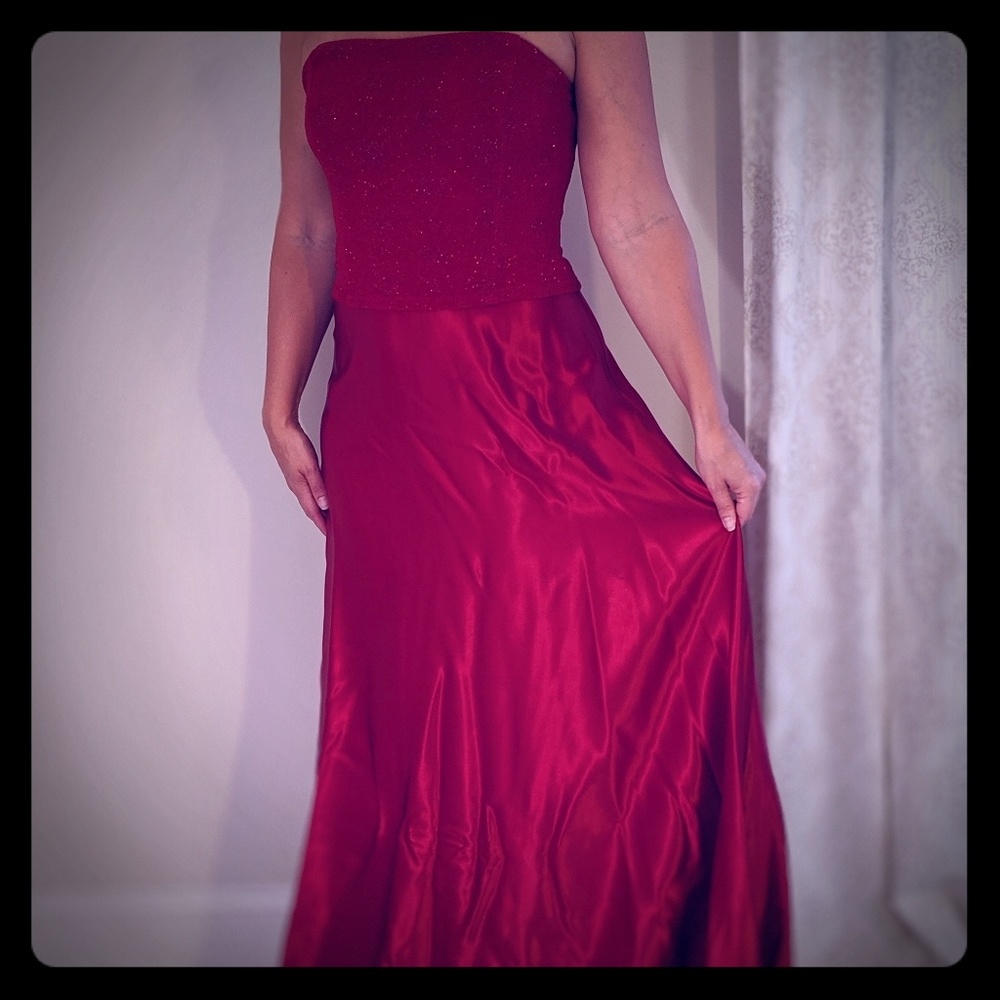 Strapless red floor length evening gown